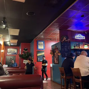 people sitting at the bar