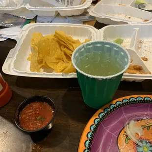 Chips, salsa, torn up boneless old bay wings &amp; a margarita (cup not included lol)