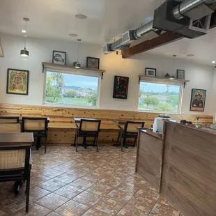 They removed 1 table &amp; added a wall bar/ shelf