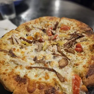 Tuscan pizzA with added grilled chicken.