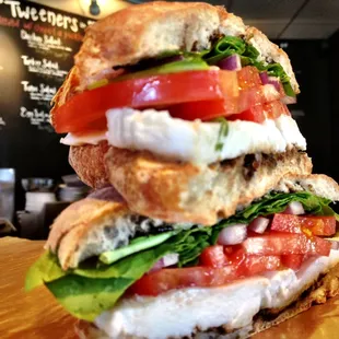Vermeer&apos;s Veggie - Buffalo Mozzarella, tomato, fresh basil, onion and spinach. Served on grilled Focaccia w/ a reduced balsamic