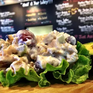 Chicken Salad with all white meat chicken, 3 different kinds of apples, red seedless grapes and a few other secret ingredients!