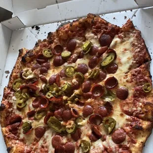 Pepperoni and jalapeño pizza