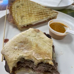 Half of the Let It Be sandwich and half of the Rafael sandwich. The Rafael sandwich came with the side of Au jus dip (not pictured).