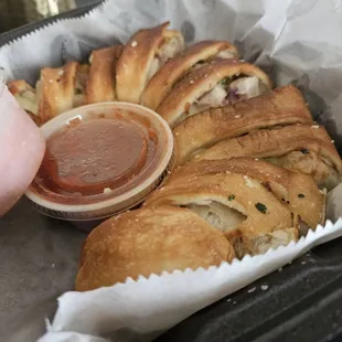 Philly cheesesteak roll with garlic dipping sauce