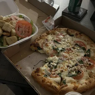 Spinach and garlic pizza and a small Caesar salad. Delish!!