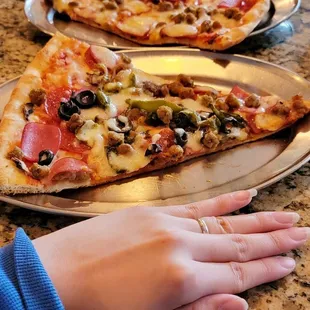 two slices of pizza on a plate