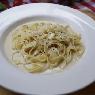 a plate of pasta on a table