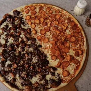 a pizza on a wooden board
