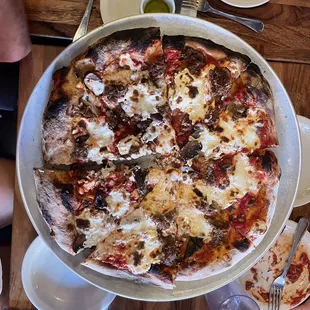 Large pizza with sausage, ricotta, and fresh garlic.