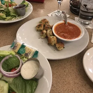 They offer a side salad as an add on and the garlic knots are one of their select appetizers