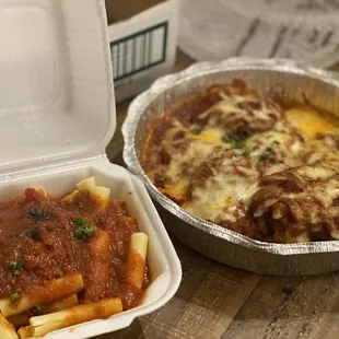 Shrimp parmigiana with a side of ziti.