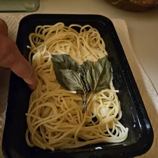 This is how little pasta there was. THis is a small container and it isn't even 1/4 full. This is just the plain pasta, sauce was on side.