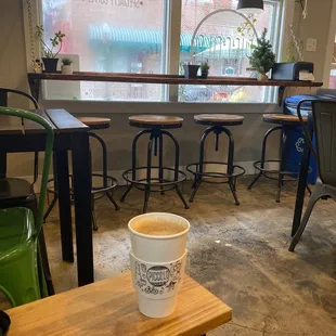 Latte from comfy chairs looking towards outside