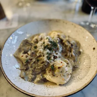 Three Cheese Mezzaluna with Wild Mushroom Marsala Cream Sauce