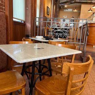 a table and chairs in a restaurant