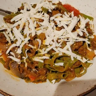 Spinach tagliatelle pasta with lamb sausage