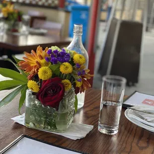 a vase of flowers on a table
