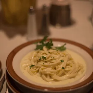 a plate of pasta on a table