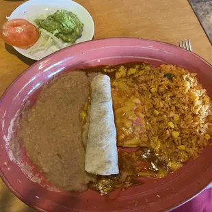 Beef fajita taco and cheese enchilada with rice, beans and guacamole