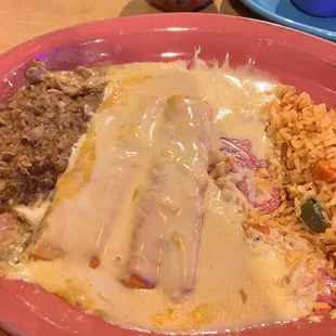 3 cheese enchiladas with queso on top. Had to dig in before I remembered to take a photo haha