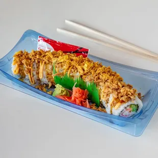 Crunch Roll 

Crab salad roll topped with spicy mayo, unagi sauce, fried onions