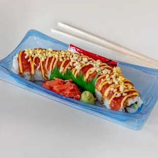 Spicy Tuna Dragon

California roll topped with spicy tuna, spicy mayo, unagi sauce, tempura crips