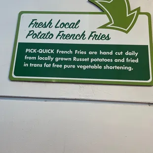 a sign for fresh local potatoes