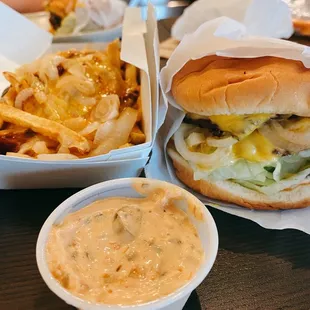 Double deluxe cheeseburger Chili cheese fries with sautéed onions