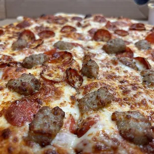 Pepperoni and half sausage. This is my current go-to-Pizza