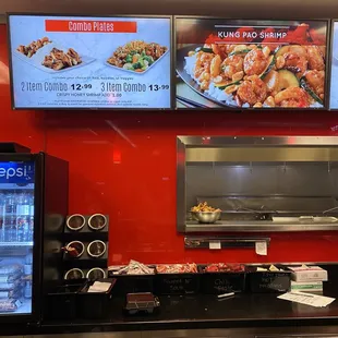 a restaurant counter with food on it