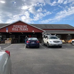 parking lot with cars parked in front