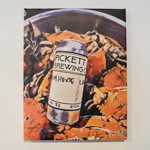 a can of beer in a bowl of leaves