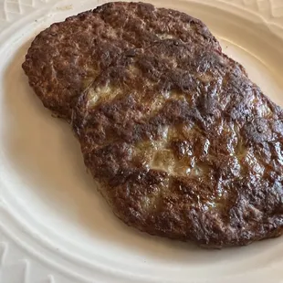 a hamburger on a plate