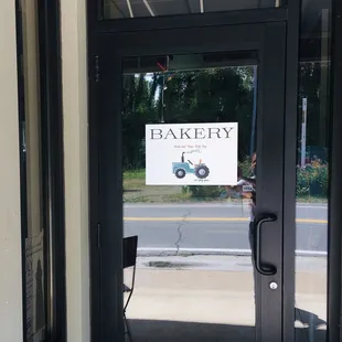 the entrance to a bakery