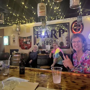a woman sitting at a bar