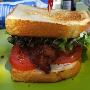 Seasoned, juicy tomatoes. Perfectly toasted Sourdough. Crunchy bacon. Perfect!