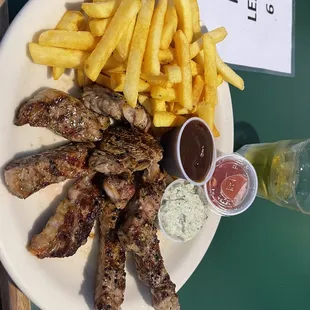 a plate of food with fries and ketchup