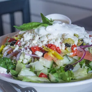 a salad on a white plate