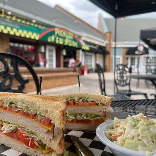 a sandwich and coleslaw