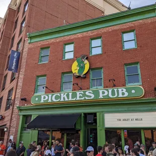 a crowd of people standing outside