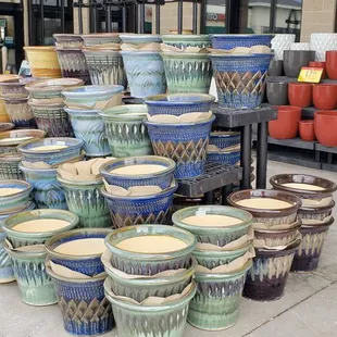 a large pile of pottery