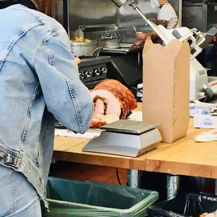 Porchetta carving at noon:30