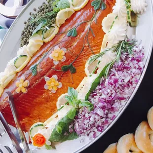 Honey Smoked Salmon with capers, cream cheese, red onion, lemons and mini bagels.