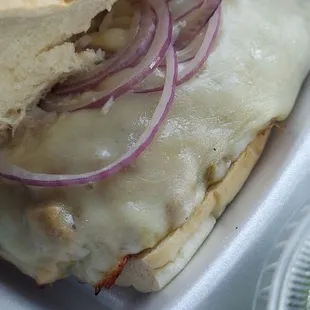 Inside of the Razorback Honey Dijon Pepper BBQ Sandwhich. I got mine without  &amp; . Normally, it would come with them as well on it.