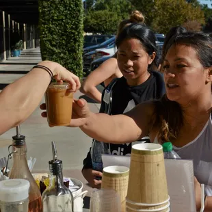 a group of people sitting at a table