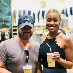 a man and a woman standing next to each other