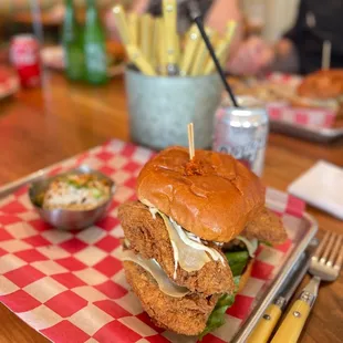Crawfish boil fried Chicken sandwich 2 handed with potatoes salad