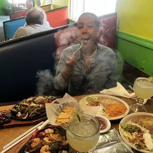 The delicious fajitas were smoking hot.