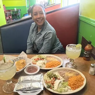 A big plate of rice, refried beans, pico, Del Gallo, lettuce, tomato, sour cream, and guacamole, along with super fresh flour tortillas.